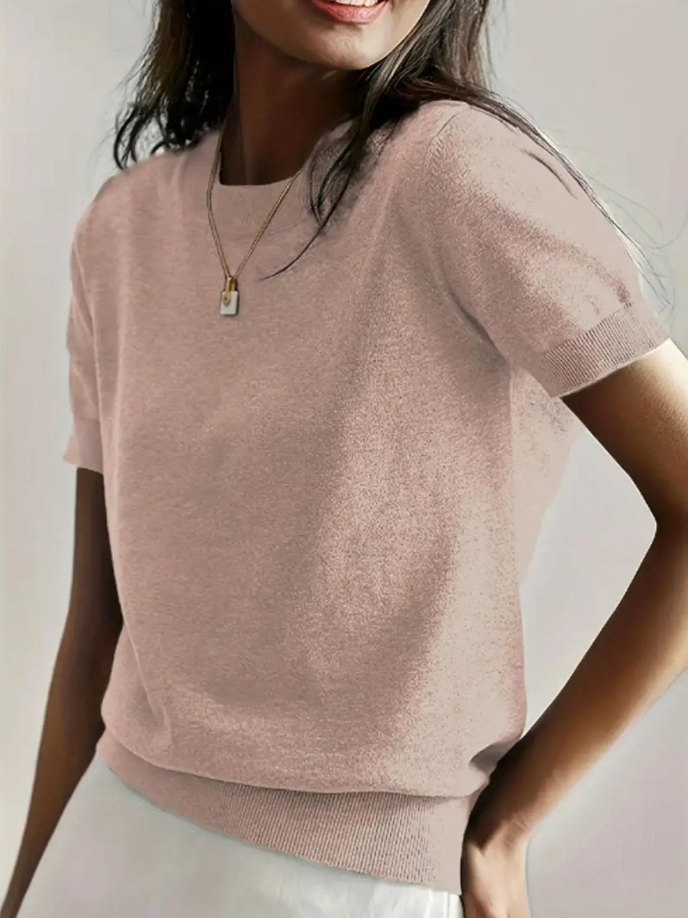 Le pull que l'on prend en premier.