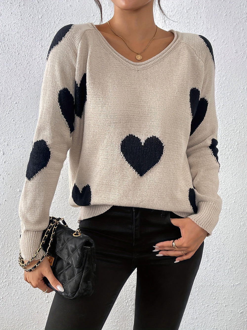 Le pull que l'on prend en premier.