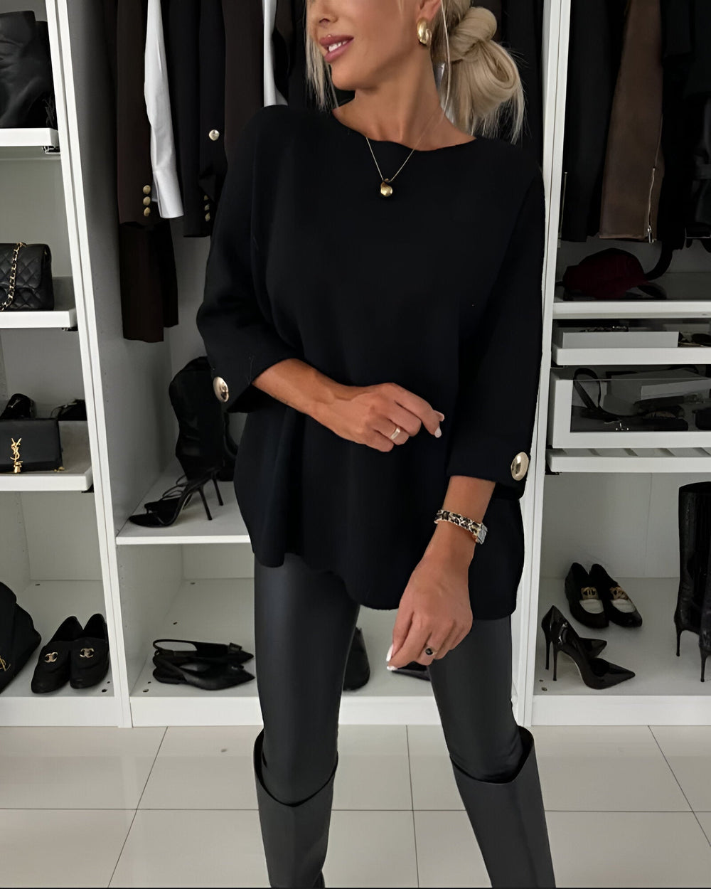 Le pull que l'on prend en premier.