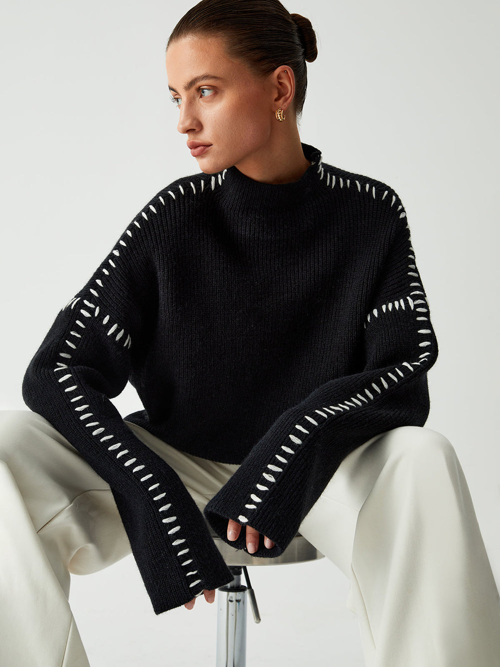 Le pull que l'on prend en premier.