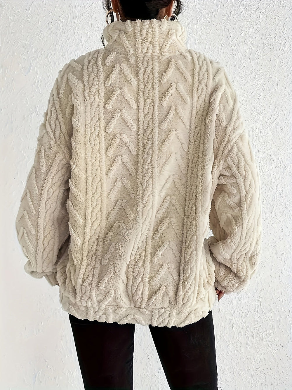 Le pull que l'on prend en premier.