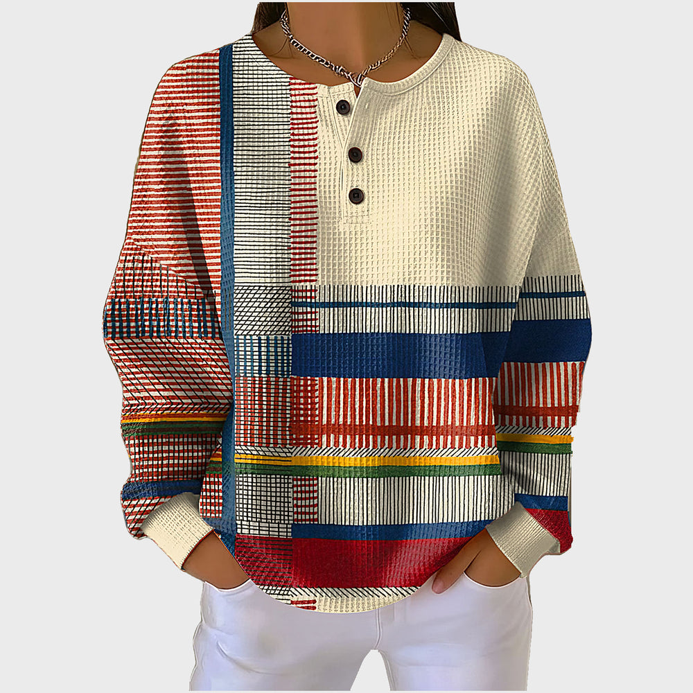 Le pull que l'on prend en premier.