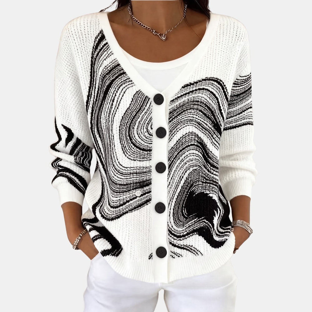 Le pull que l'on prend en premier.