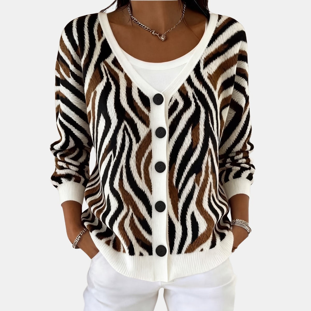 Le pull que l'on prend en premier.