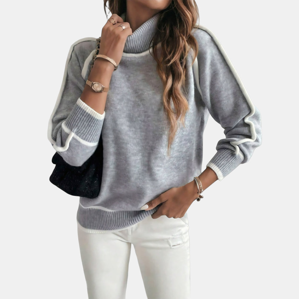 Le pull que l'on prend en premier.