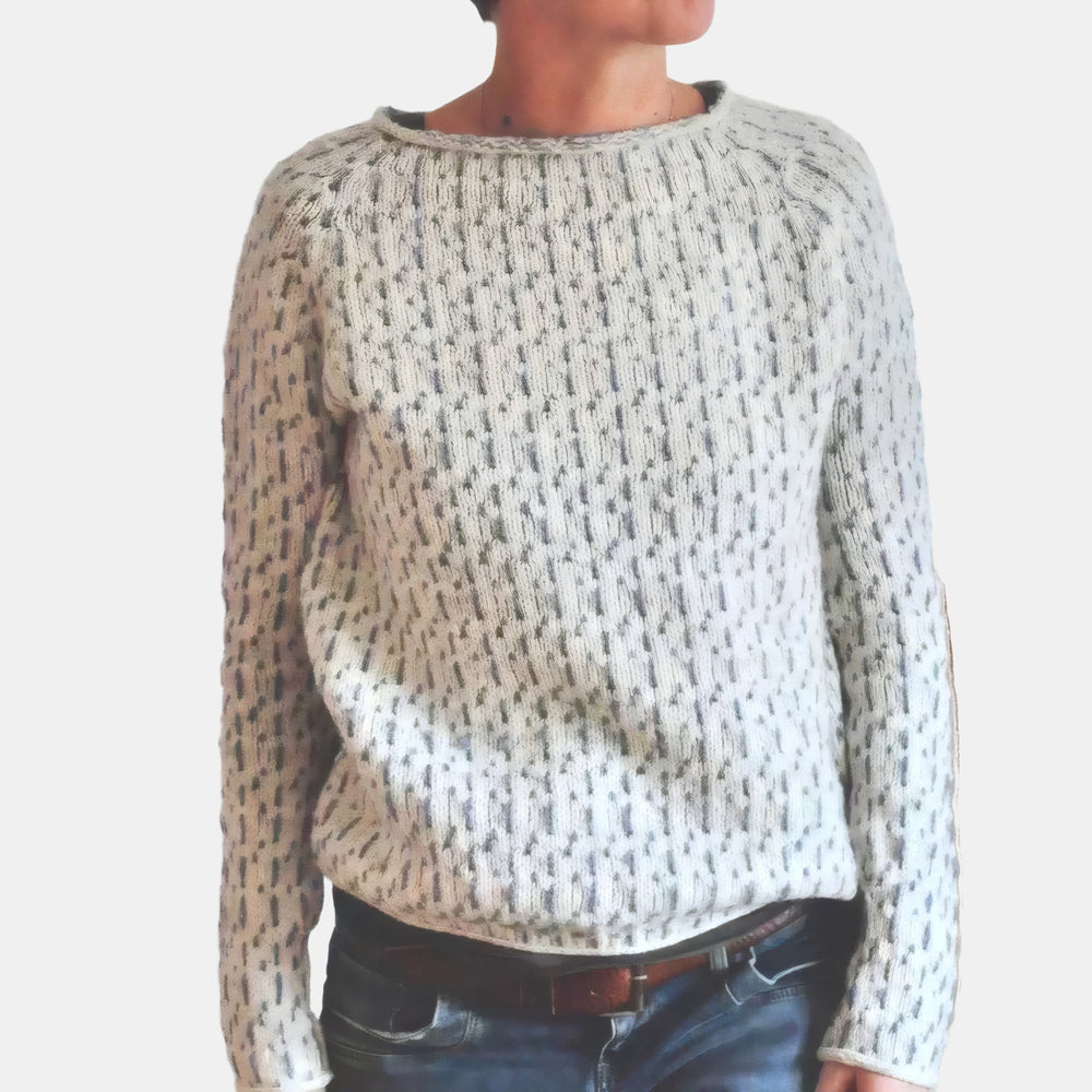Le pull que l'on prend en premier.