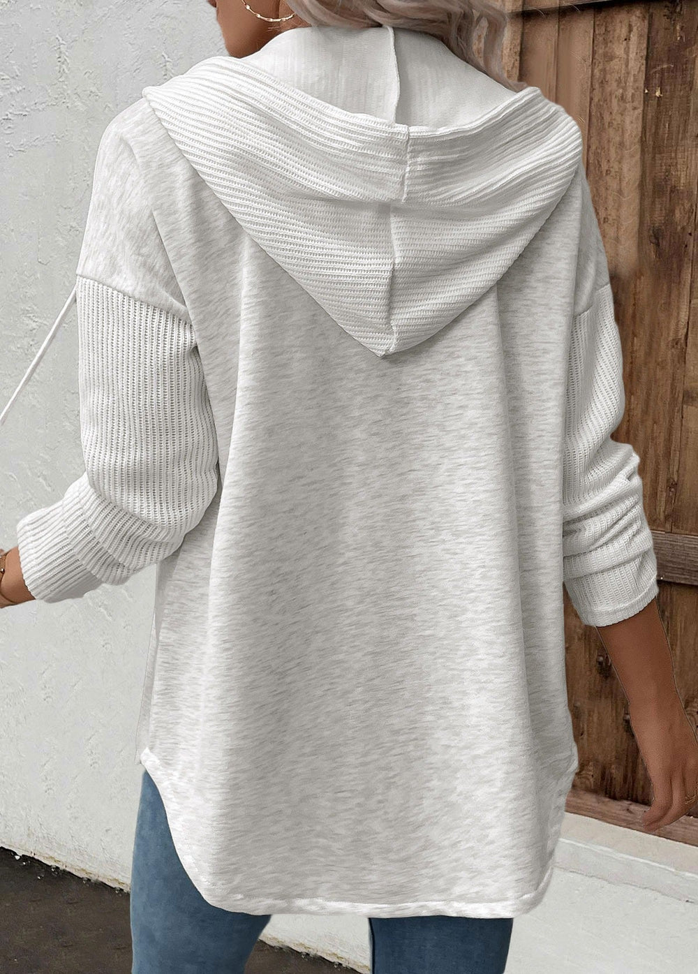Le pull que l'on prend en premier.