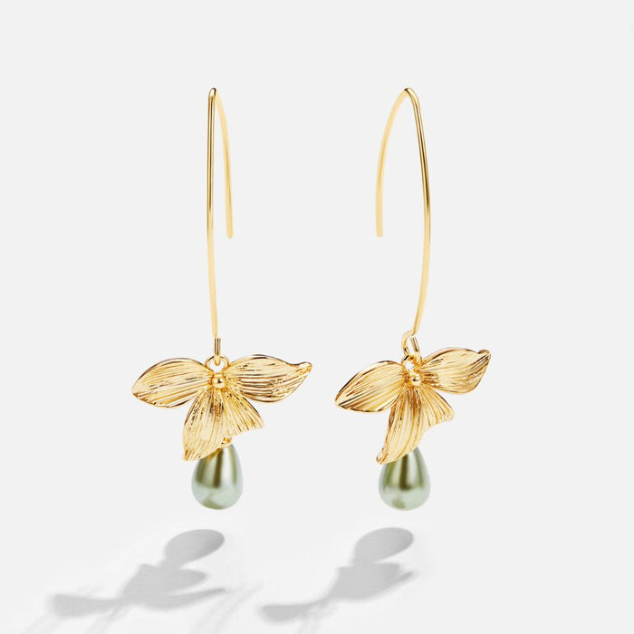 Boucles d’oreilles en or à surface perlée