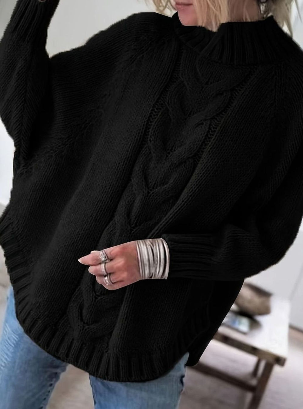 Le pull que l'on prend en premier.