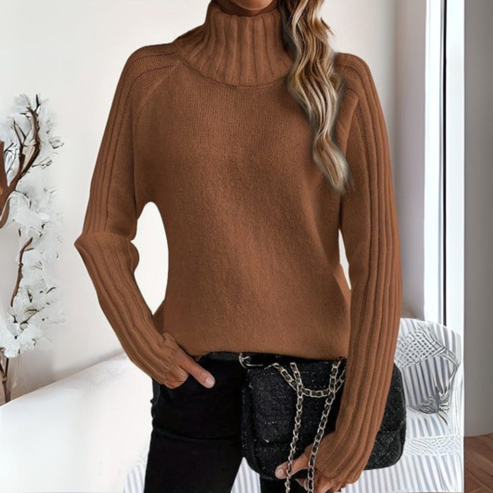 Le pull que l'on prend en premier.