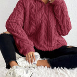 Cassandre | Pull torsadé à col montant zippé