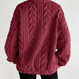 Cassandre | Pull torsadé à col montant zippé