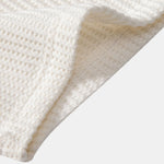 Ensemble — polo gaufré à col V & short gaufré en maille à cordon