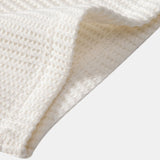 Ensemble — polo gaufré à col V & short gaufré en maille à cordon