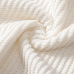 Ensemble — polo gaufré à col V & short gaufré en maille à cordon