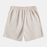 Ensemble — polo gaufré en maille & short gaufré à cordon