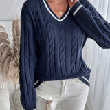 Ninon | Pull à torsades et col V