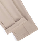 Ensemble Améline — polo en maille jacquard géométrique rayée & pantalon fuselé