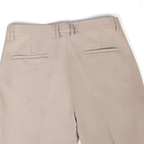 Ensemble Améline — polo en maille jacquard géométrique rayée & pantalon fuselé