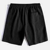 Ensemble — polo jacquard géométrique & short