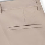 Ensemble Améline — polo en maille jacquard géométrique rayée & pantalon fuselé