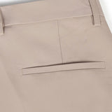 Ensemble Améline — polo en maille jacquard géométrique rayée & pantalon fuselé