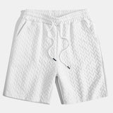 Ensemble — polo jacquard géométrique & short jacquard géométrique