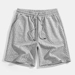 Ensemble — polo jacquard à losanges géométriques & short