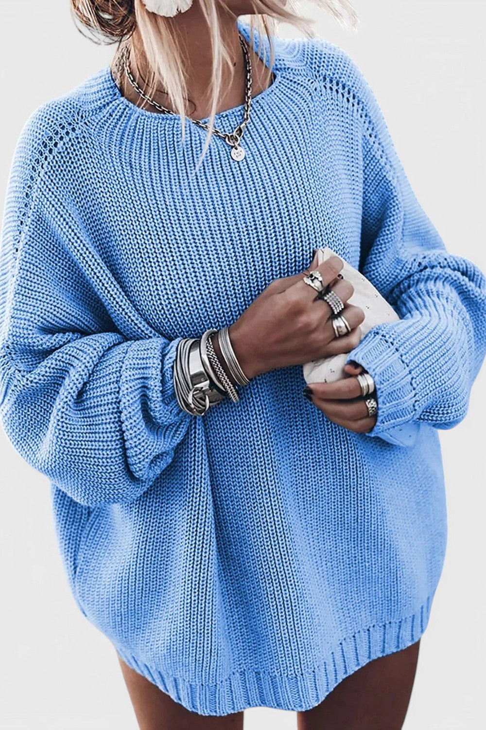 Le pull que l'on prend en premier.
