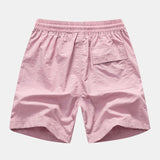 Ensemble — chemise à imprimé flamants roses et fleurs & short de bain