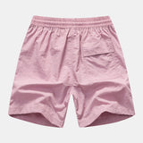 Ensemble — chemise à imprimé palmiers et flamants roses & short de bain