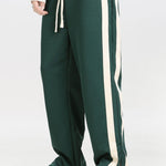 Ensemble — sweat polo patchwork color block & pantalon rayé à ourlet fendu