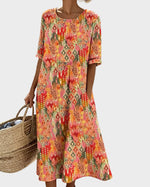 Emma | Robe midi fleurie fluide et légère
