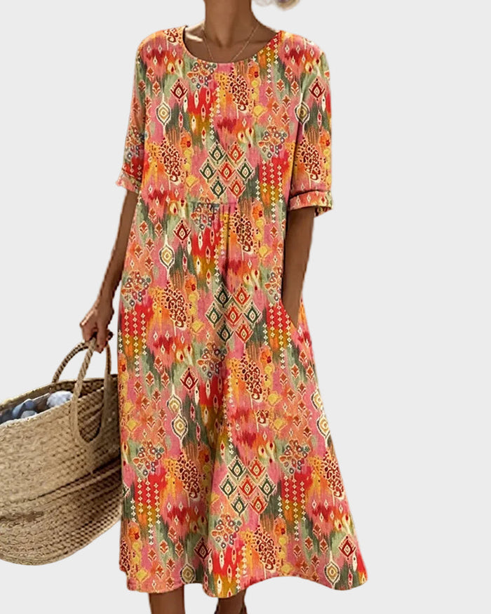 Emma | Robe midi fleurie fluide et légère
