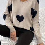 Bénédicte | Pull à col rond et motif cœurs