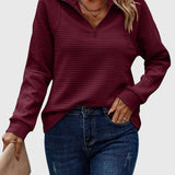 Christine — Pull élégant à demi zip