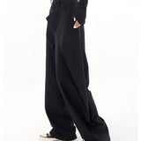 Adeline | Pantalon large à devant croisé boutonné