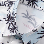Ensemble — chemise à imprimé palmiers et voiliers & short de bain mi-long à cordon
