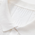 Ensemble — polo en maille jacquard géométrique & pantalon fuselé coupe slim