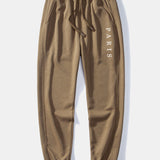 Ensemble Capucine — sweat à col rond coupe décontractée à slogan Paris & pantalon de jogging