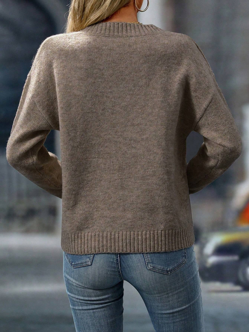 Le pull que l'on prend en premier.