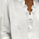 Huguette | Blouse raffinée à col V volanté