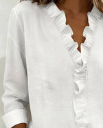 Huguette | Blouse raffinée à col V volanté