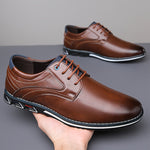 Chaussures habillées John — classiques à lacets