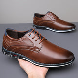 Chaussures habillées John — classiques à lacets
