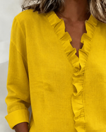 Huguette | Blouse raffinée à col V volanté