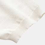 Ensemble Capucine — polo en maille jacquard géométrique rayée & pantalon fuselé