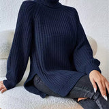Lorraine | Pull en grosse maille à col roulé et fentes latérales