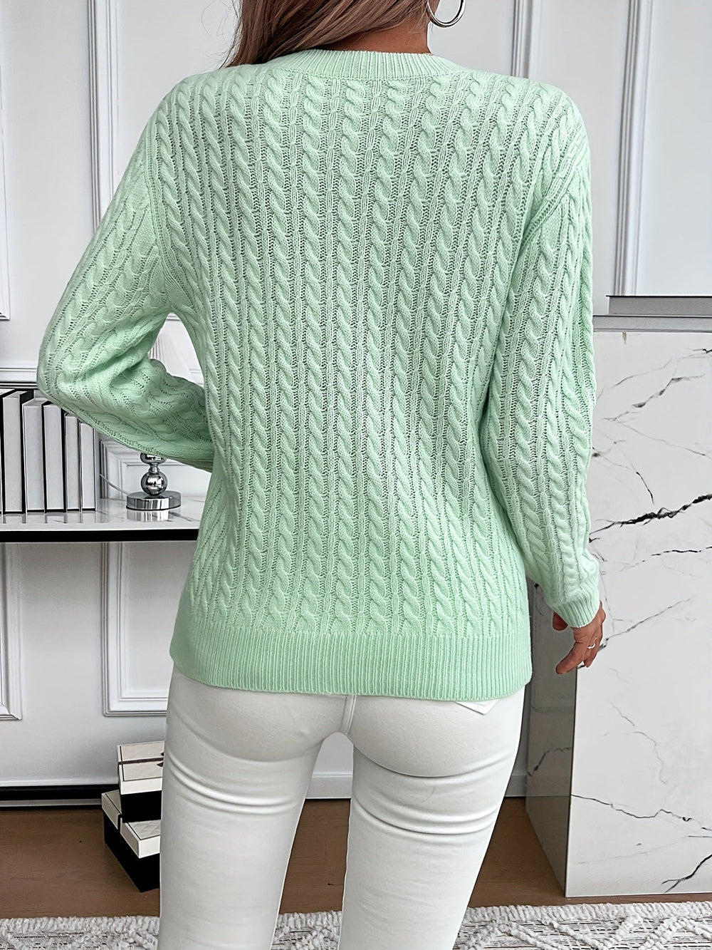 Le pull que l'on prend en premier.