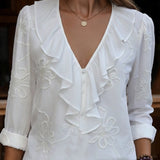 Isaure | Blouse à volants, col V et broderie fleurie